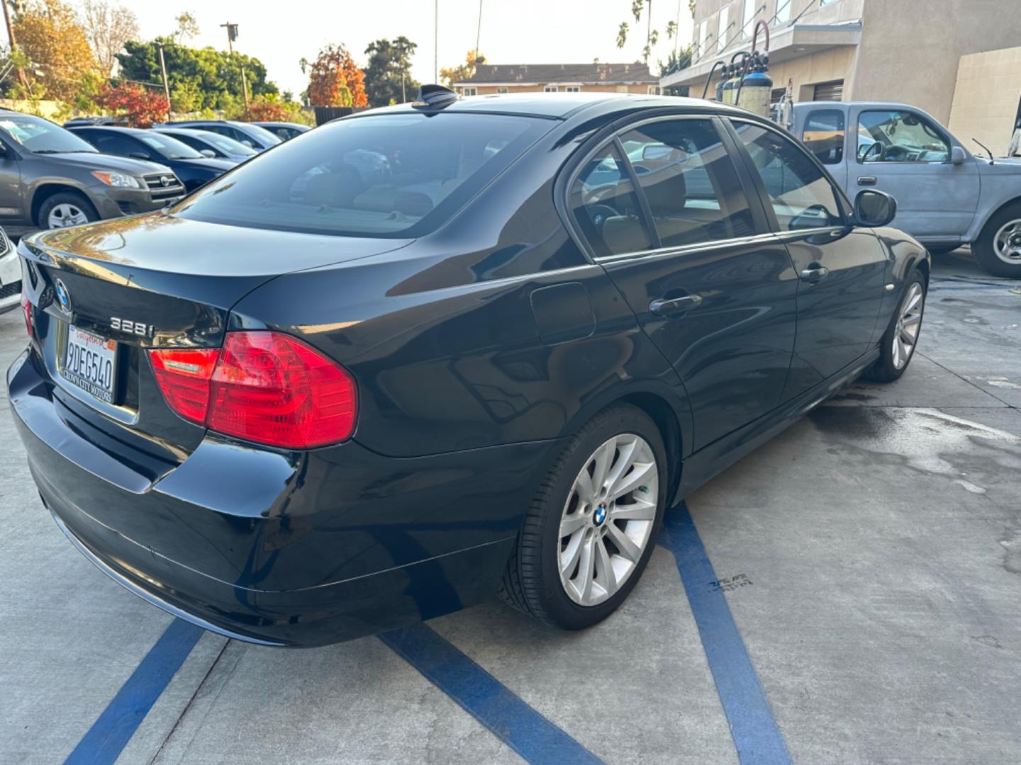 2011 Black /tan BMW 3-Series 328i (WBAPH7C58BE) with an 3.0L L6 DOHC 24V engine, located at 30 S. Berkeley Avenue, Pasadena, CA, 91107, (626) 248-7567, 34.145447, -118.109398 - New Tire! Leather Interior! Looks and Drives Good! Bad credit? We can help! We are the bank. All our cars are thoroughly inspected and reconditioned by our technicians. FREE CARFAX report. Stop by or call to speak with our friendly staff. Whether you have bad credit, no credit, bankruptcy, or repo - Photo#5